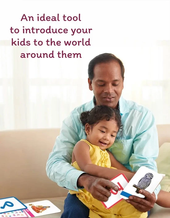 Child practising how to learn Hindi Varnamala with tracing worksheets and flashcards at home